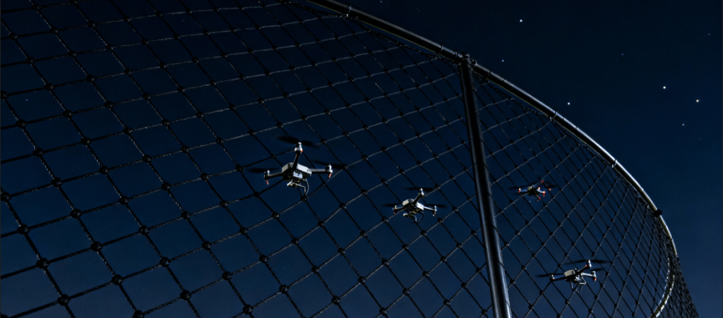 Heavy-duty knotted drone safety netting with high-tensile strength for perimeter airspace security.